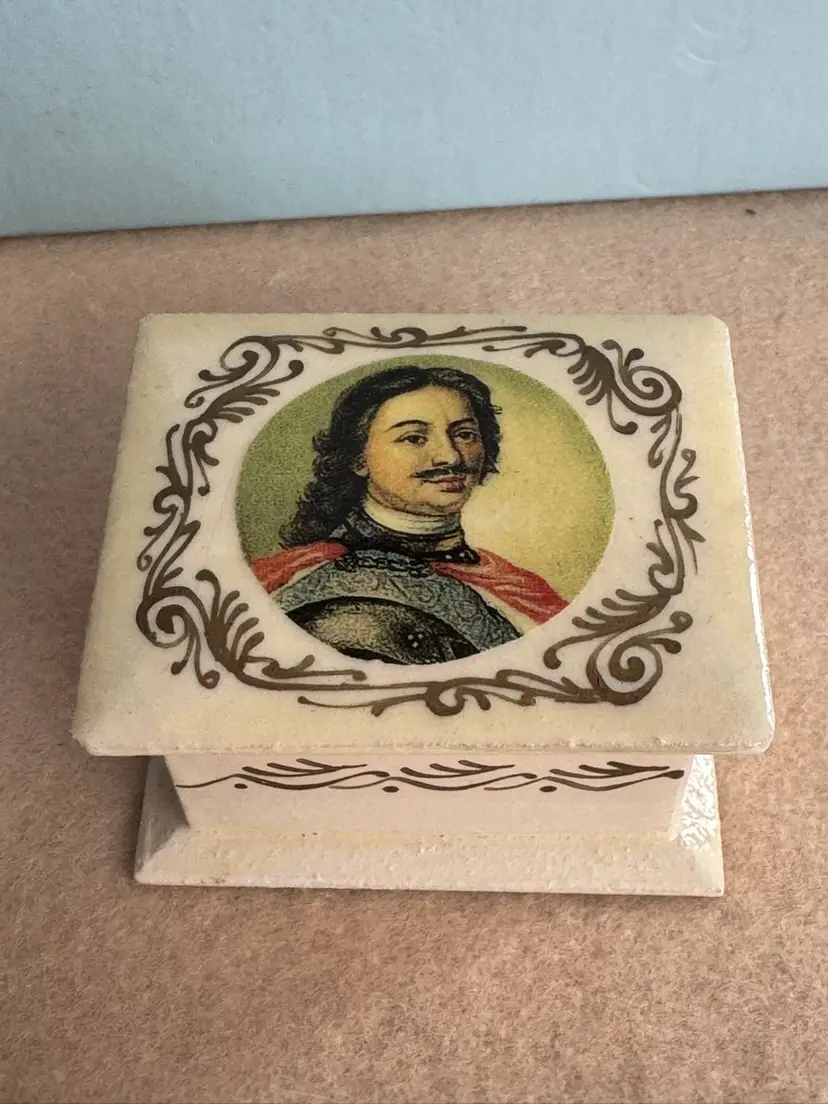 A vintage Russian lacquer ware box with a portrait of Peter the Great