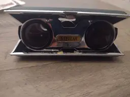 Vintage Stellar folding binoculars in good condition