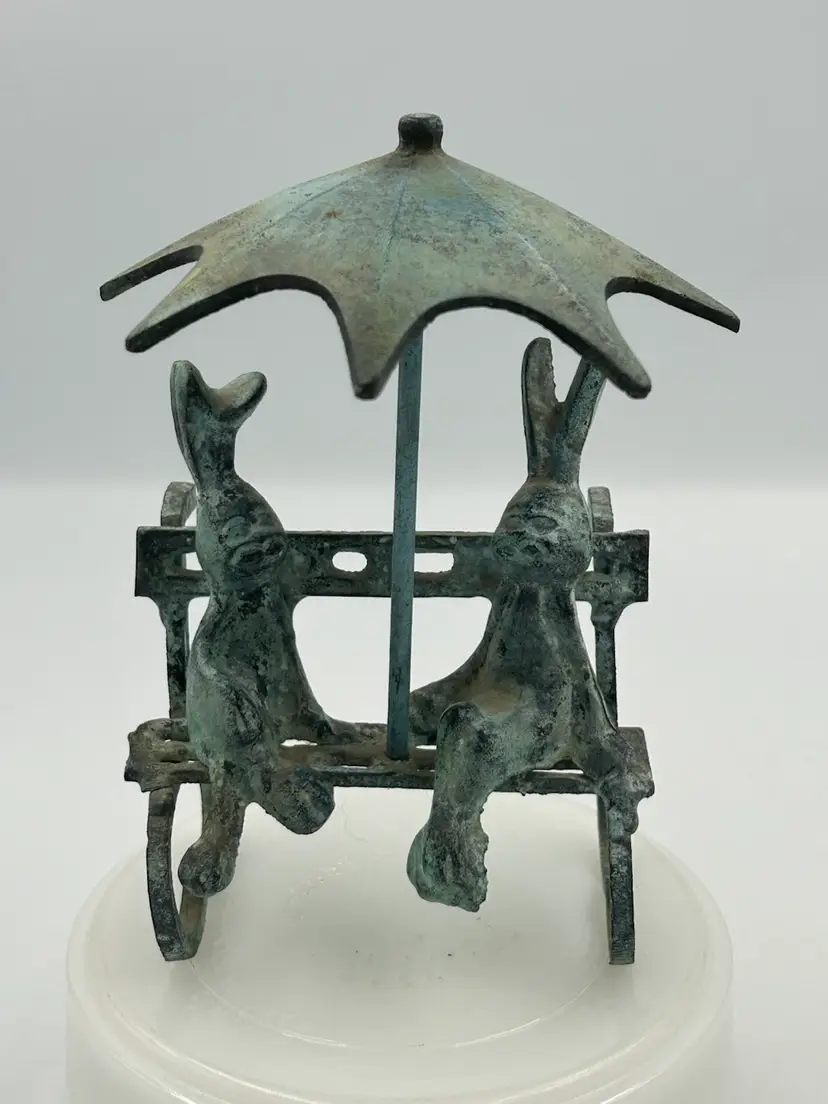 Brass With Patina Bunnies Sitting On Bench Under Umbrella Figurine