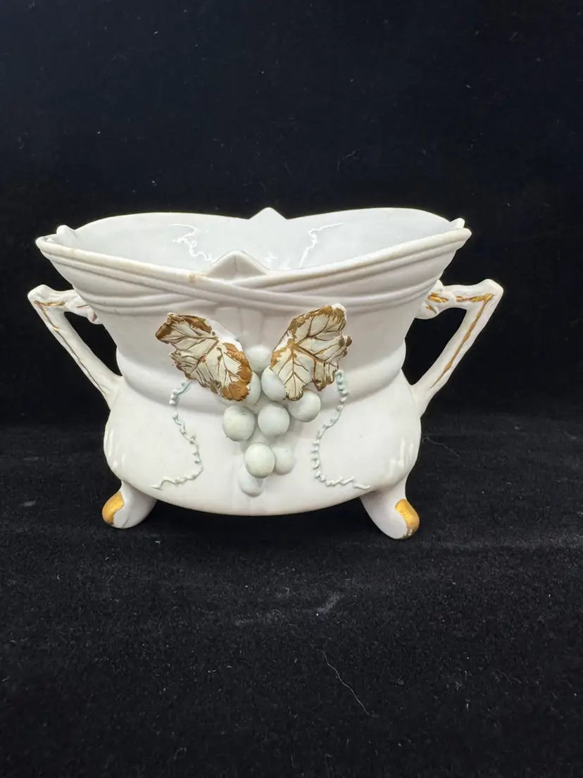 Vintage Lefton China footed bisque bowl with applied grape and leaf decoration, One Chip On Leaf As Pictured