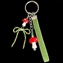 Handmade By Me - Glass Mushroom Charm And Green Seed Bead Bow Keychain With Velvet Ribbon, Handmade Mushroom Keychain, Handmade Mushroom Bag Charm, Glass Mushroom Charm, Seed Bead Bow Charm, NN Artist, Handmade Keychain, Handmade Bag Charm, Glass Mushroom Bag Charm With Velvet Ribbon