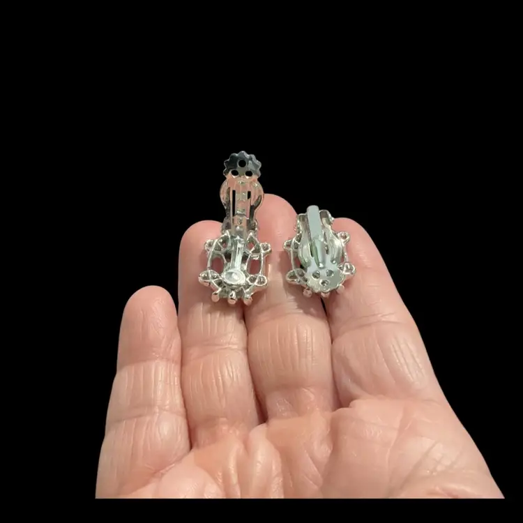 Vintage Silvertone Clip On Earrings. With AB Glass Rhinestones And With A Beautiful Open Work Setting. Not Signed