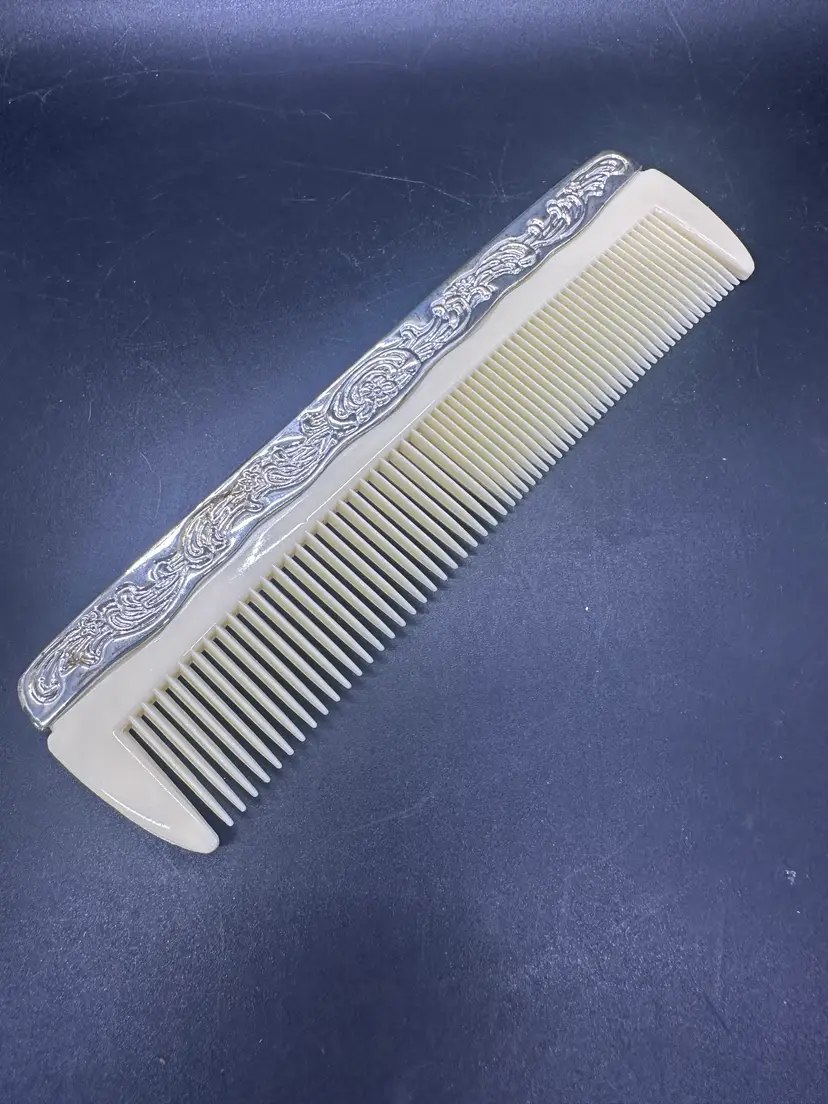 59. VTG Silver-plated hair comb. 1940s