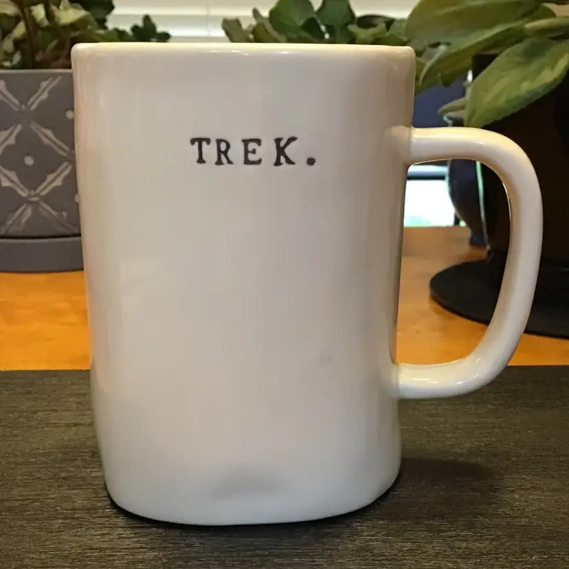 Rae Dunn Trek. In Typewriter Print With Bicycle Coffee Tea Mug Cup