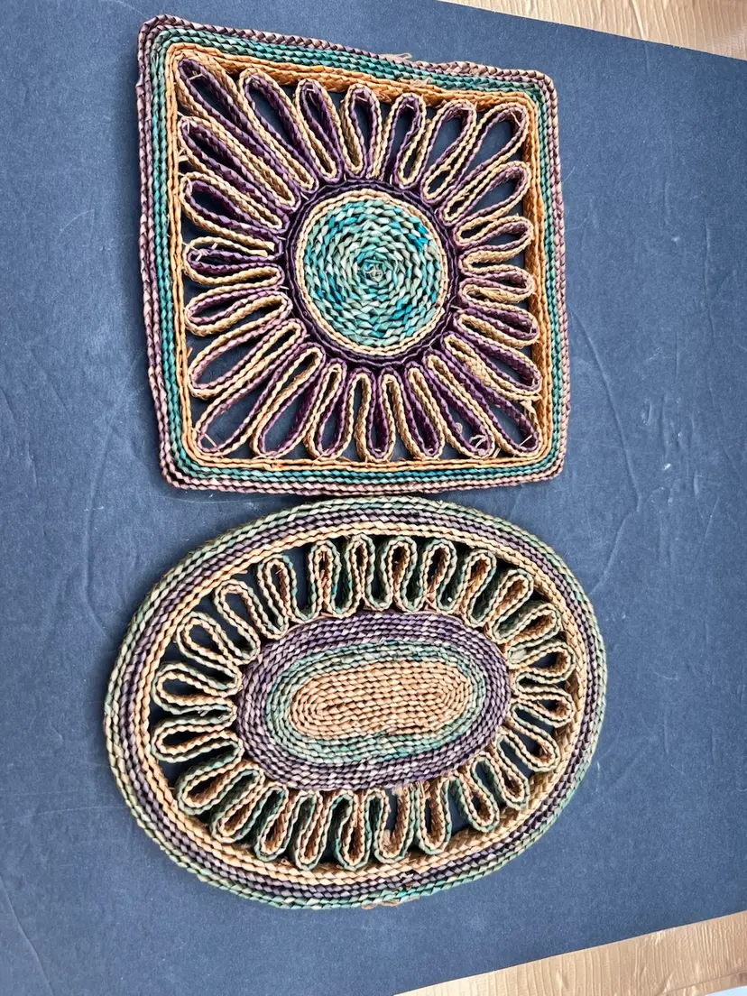 #1021-B Set Of Two Vintage Woven Rattan/Wicker Trivets. One 6” Square, One 8” X 6” Oval