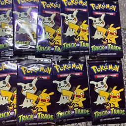 9 Packs Of Pokemon Trick Or Trade Cards