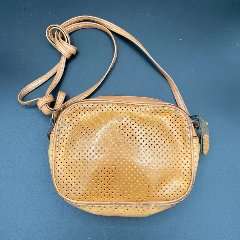 Vintage perforated Italian leather purse with long strap