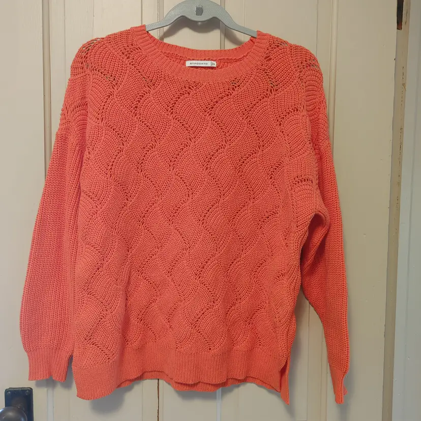 Top- Brand: Staccato. Size Medium. Coral colored sweater. 60% Cotton, 40% Acrylic. No callouts.