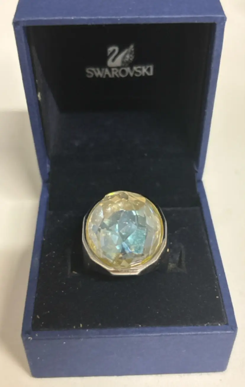 Swarovski Authentic Stamped Ring Featuring a Prominent Faceted Oval Crystal Presented within its Distinctive Blue Swarovski Box Size 6.5