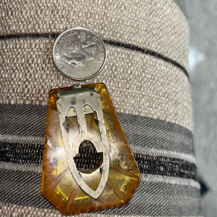 Intricate Carved Apple Juice Dress Clip 
Missing Rhinestones