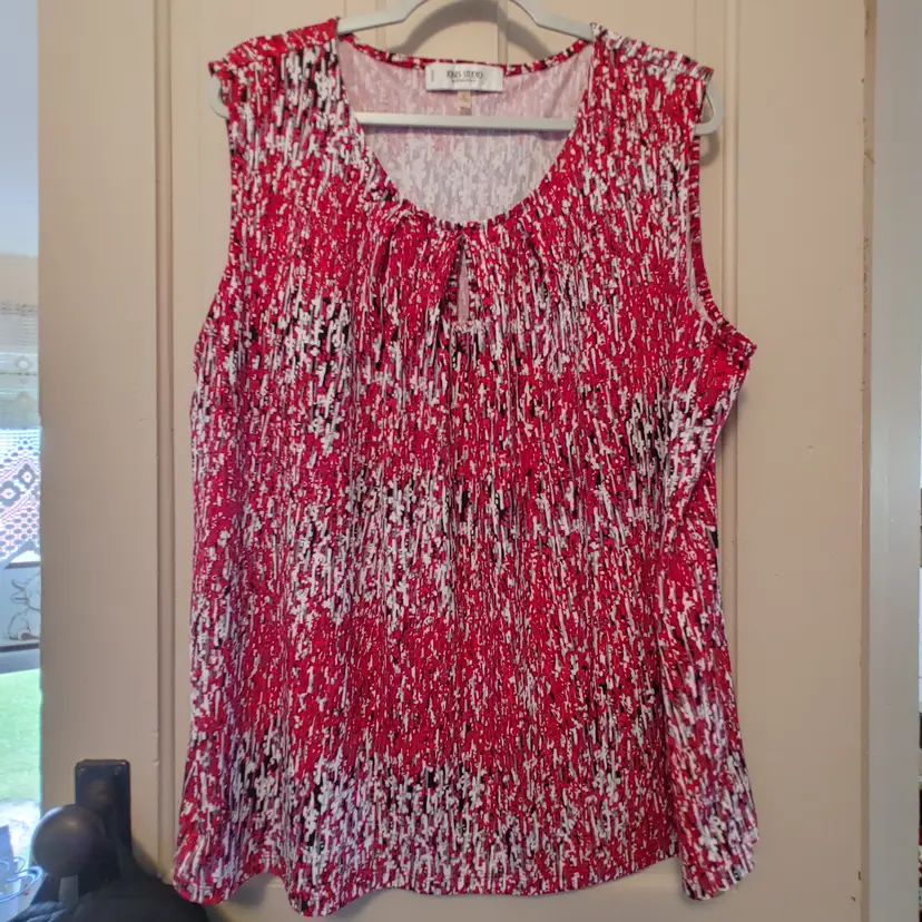 Top- Brand: Jones Studio. Size 3X. Red white black sleeveless top. Material- 96% polyester, 4% elastane. No callouts.