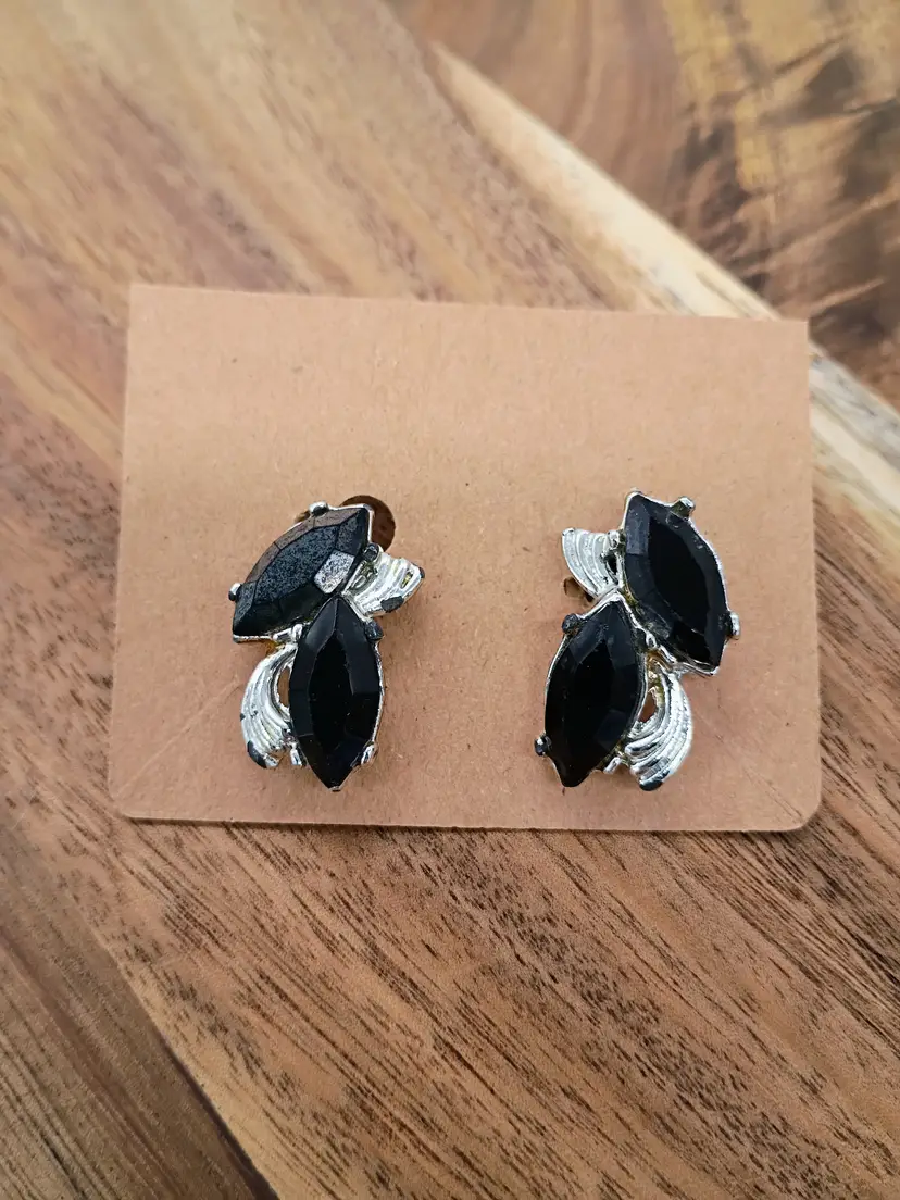 Silver Tone and Black Marquise Shaped Glass Rhinestone Clip on Earrings.