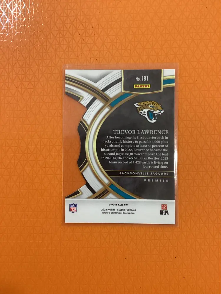 2023 Panini Select Trevor Lawrence Premier Level Die Cut Black & Yellow Prizm SP