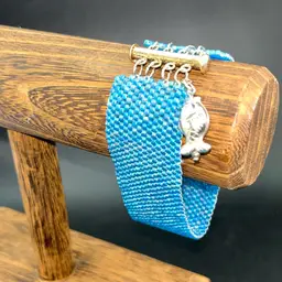 Blue Woven Bracelet With Fancy Catch And Dangling Fish 7 1/4”