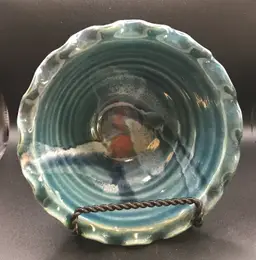 Stamped ruffled pottery bowl made in USA