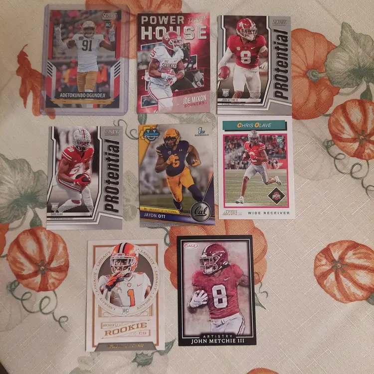 Lot of 21 college football cards. 4 auto's, 1 #'d, +. Letters M N O.