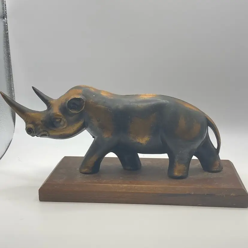 Metal Rhinoceros Mounted On Wood Base