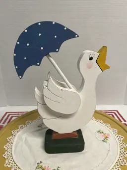 Vintage 1990’s wooden folk art goose holding umbrella figurine shelf sitter