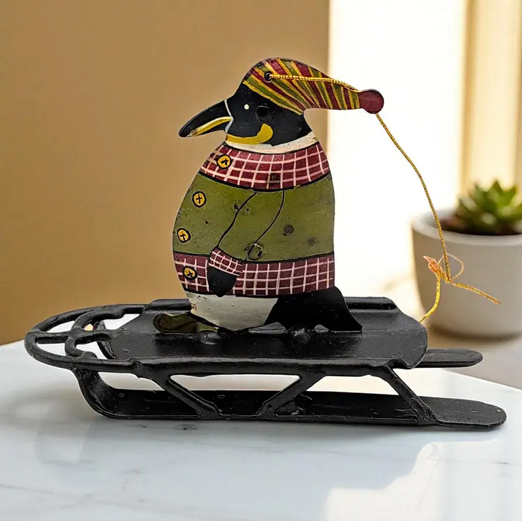 Foreside Primitive Metal Penguin Riding Sled Toboggan Sweater Whimsical Hanging