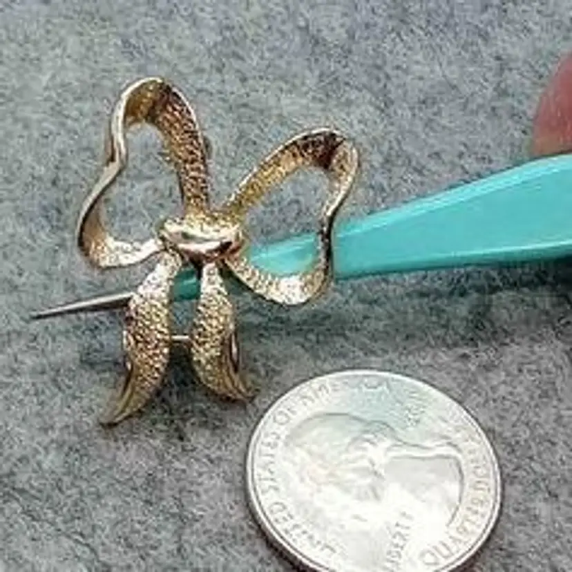 Silver Tone Bow Brooch signed by Gerry's