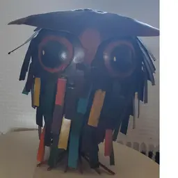 Little Spiky Owl Sitter.