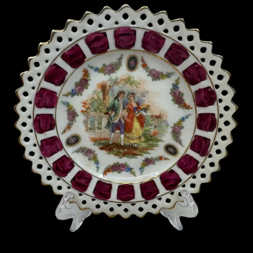 Vintage reticulated German porcelain plate with floral design and velvet inserts. 5.5”