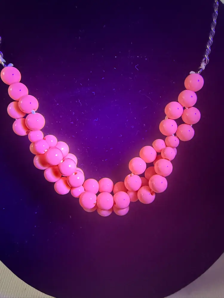Pink Plastic Beads UV Glow