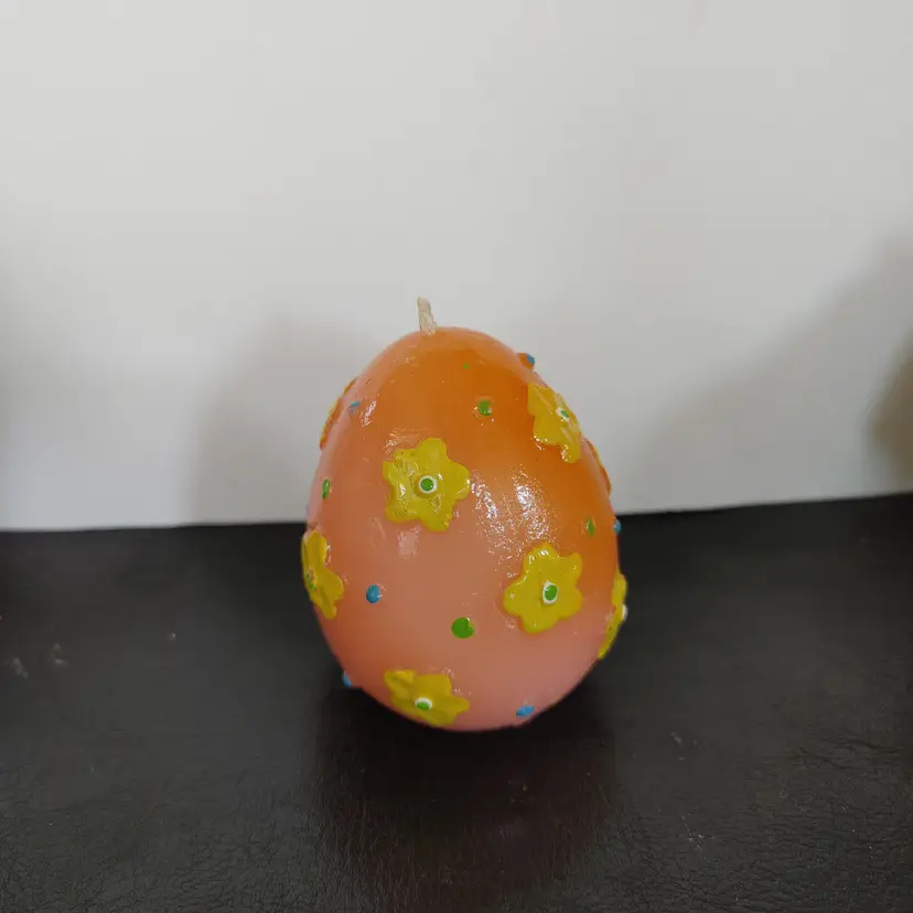 Candle- Peach with yellow flowers Easter Egg. 3 inches high.