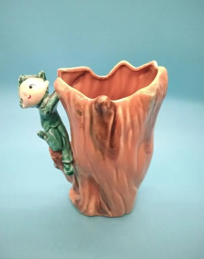 Pixie, Green Pixie On A Log