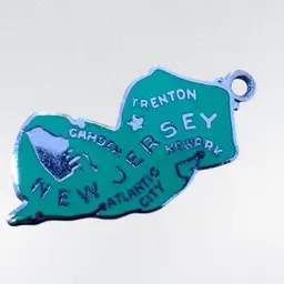 #37 Wells Sterling New Jersey Green Enamel Charm 1”