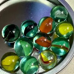 11 Cat’s Eye Marbles