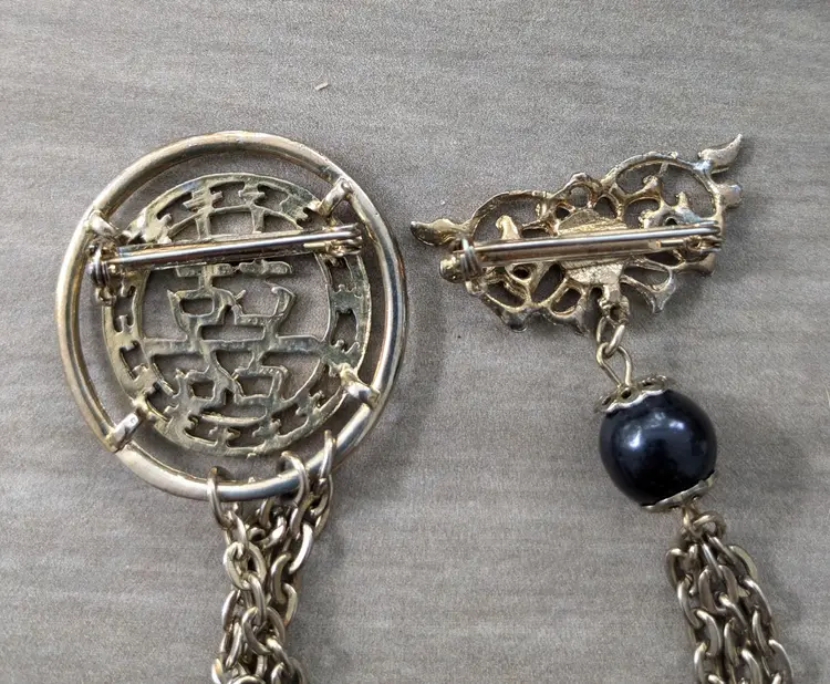 Swag Brooch with Asian Motif