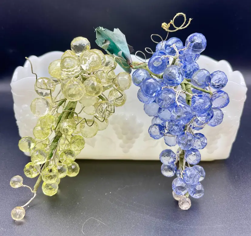2 clusters purple and green bunches of decorative faceted plastic grapes. Awww