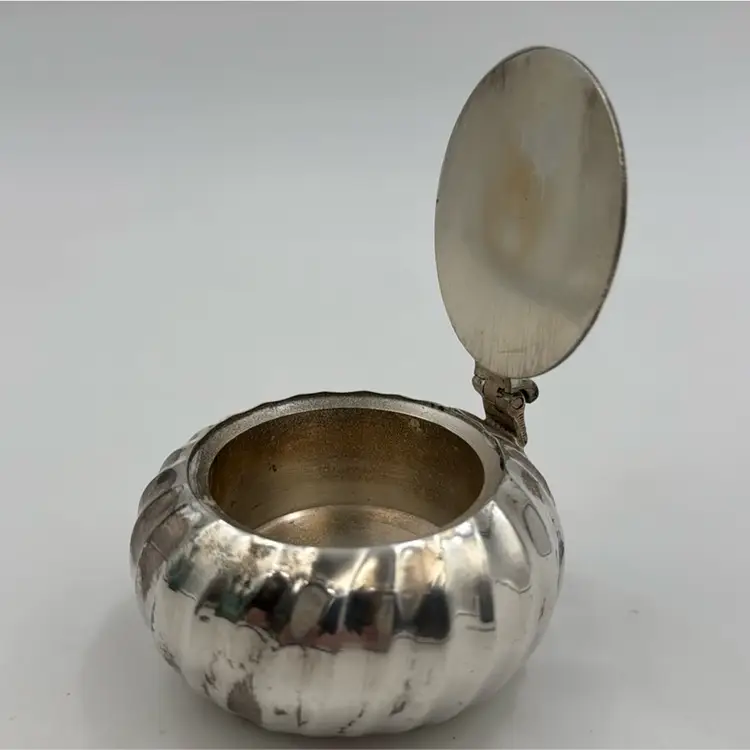 17. Tea Light Snuffer