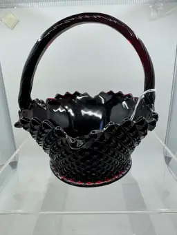 Westmoreland black amethyst hobnail glass basket with a Significant Yellow Glow Under Black Light.