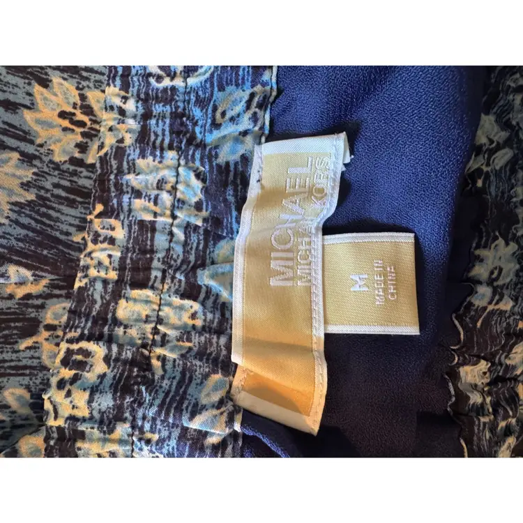 NWOT Michael Kors Lakheri Leaf Heritage Blue Slit Maxi skirt.
Size Medium