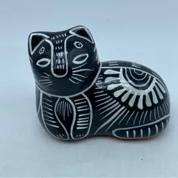 #3034 Vintage Mexican black ceramic cat with incised white folk art designs 4” x 3.5”