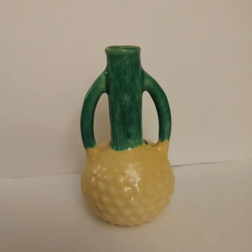 Yellow and green pineapple looking vase. 4 in high.