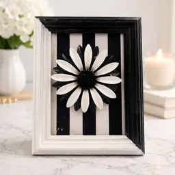Large 1960s Black and White Enamel Floral Brooch Displayed in Coordinating Frame Removable and Wearable