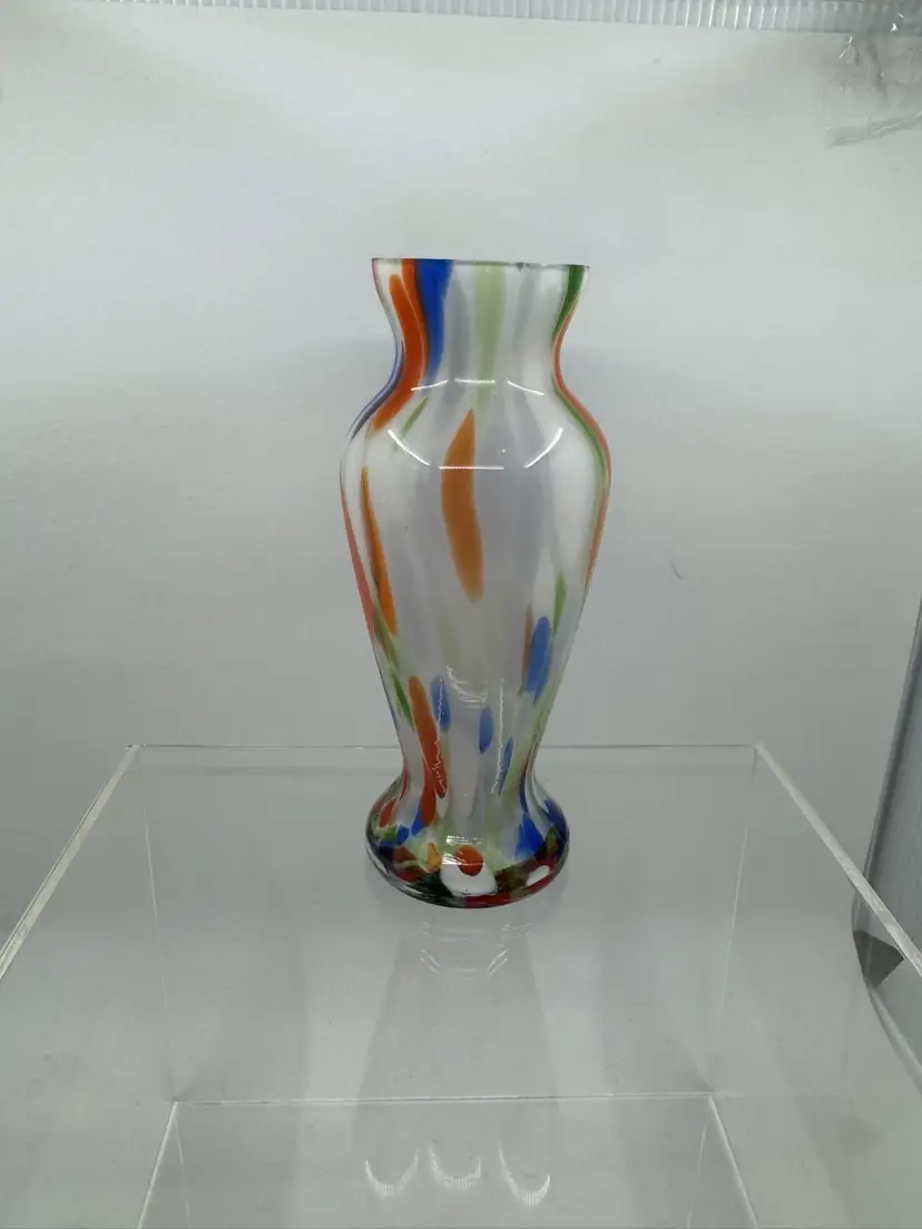 A mid-century Japanese art glass vase with confetti swirl pattern. As Is