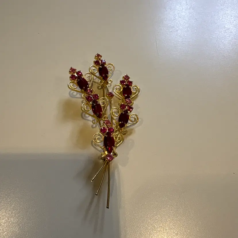 Gold Tone Intricate Piece With Garnet Stones