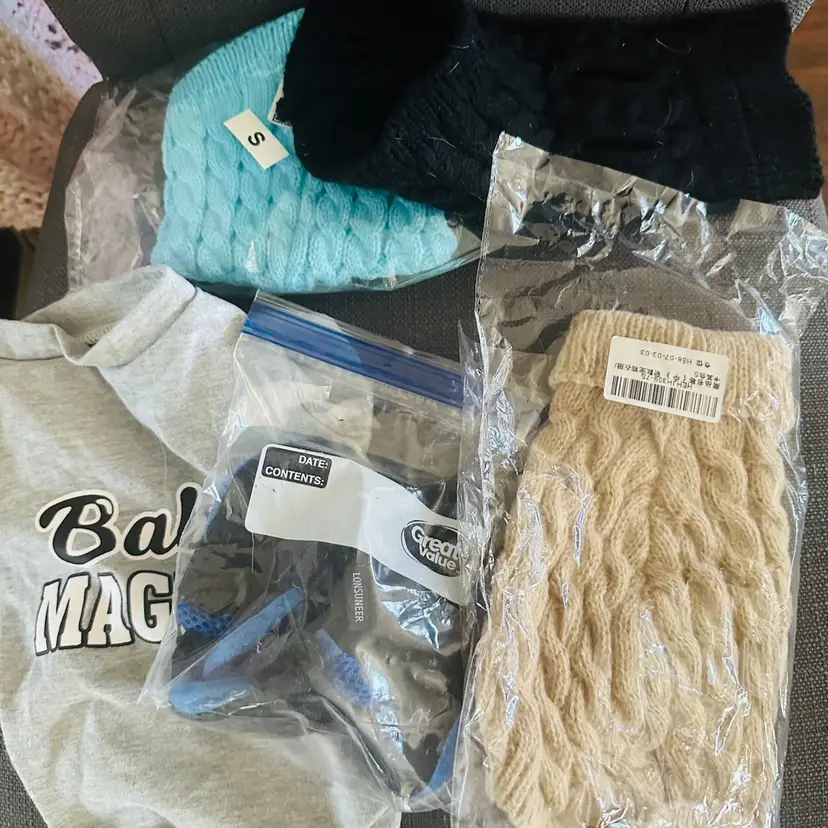 79. 4 XS Dog Sweaters