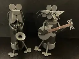 Handcrafted scrap metal sculptures of musical figures Cat and Dog