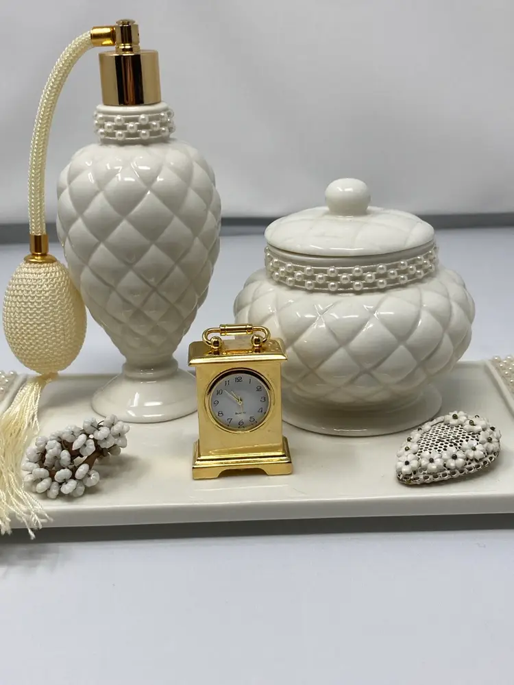 Vanity Vignette! Quilted Pattern Vanity Set (Tray 12” Long 4” Wide 2 1/2” Tall Atomizer Perfume Bottle 6” Tall 2 1/2” Wide Powder Box/Trinket Dish 4” Tall 2 1/2” Wide) Miniature Quartz Clock Working (1 3/4” Tall Just Over 1 1/4” Wide) Miriam Haskell Scarf Clip (1” Wide 1 3/4” Tall Needs Work) Vintage Milk Glass Screwback Earrings (1” Diameter)