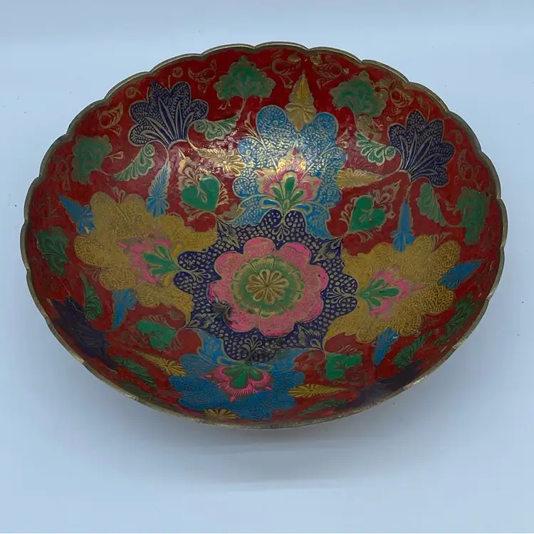#3531 A vintage enameled brass decorative bowl with floral and peacock motifs.