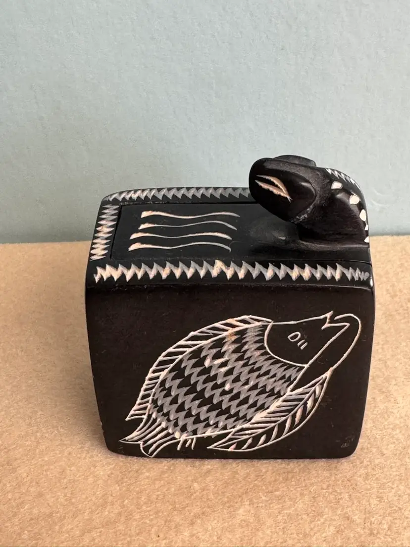 Carved Soapstone Kenyan trick box with snake and fish motifs
