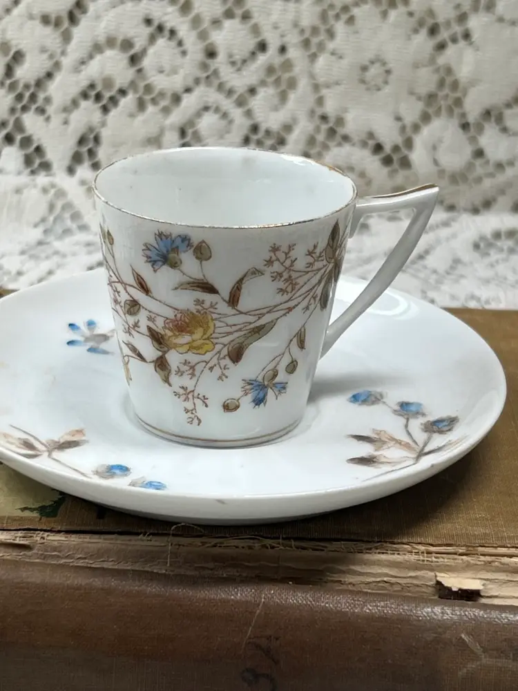 A Pair Of French Limoges Espresso, Cups, And Saucers One Saucers, Chipped