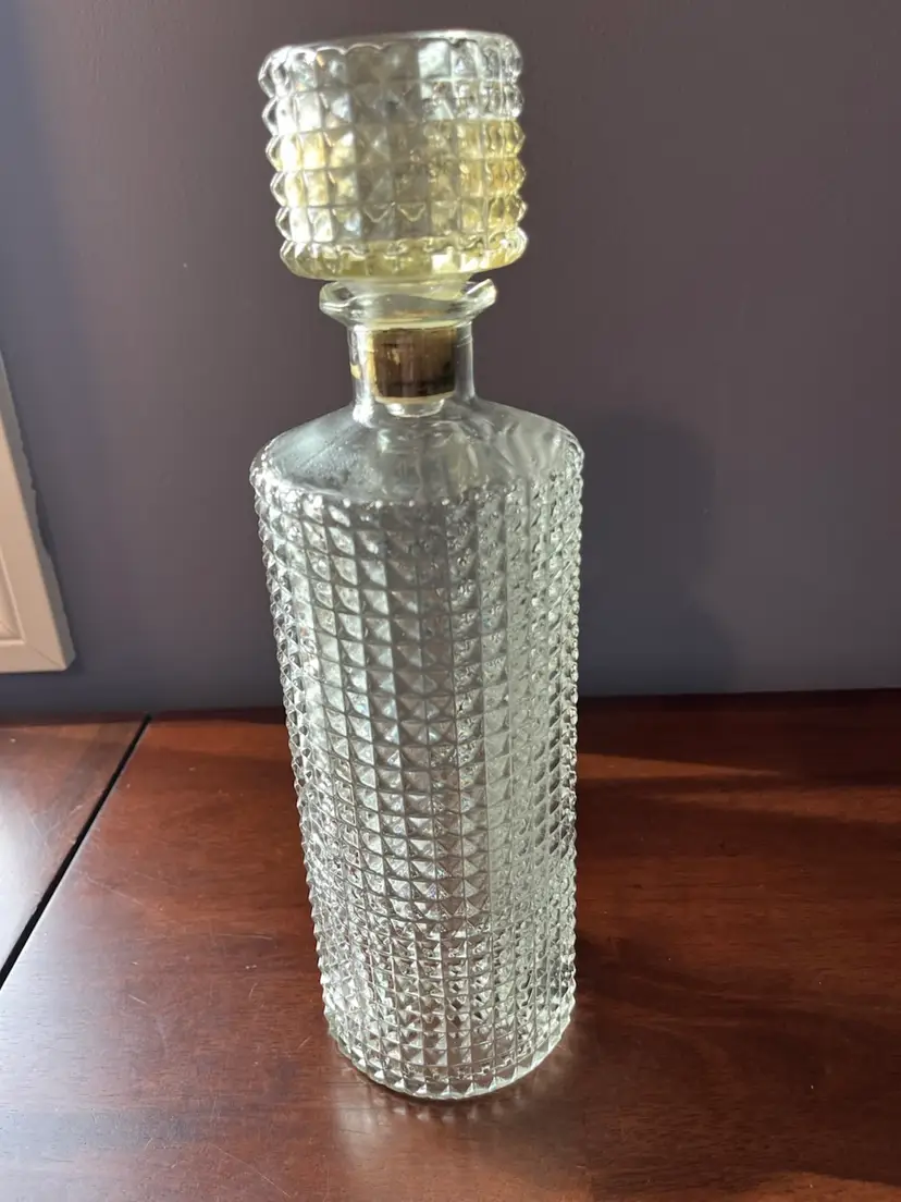 Vintage clear glass decanter with diamond point hobnail pattern and stopper. 12”