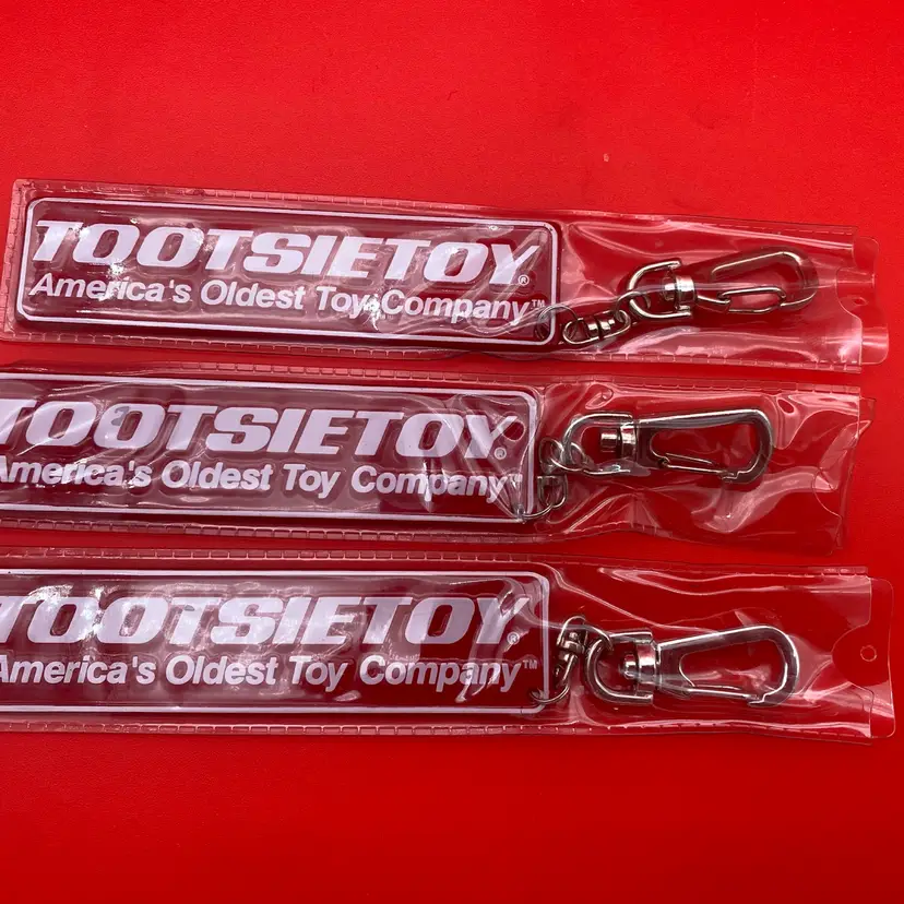 TootsieToy America's Oldest Toy Company Red Metal Keychain Trio - New Old Stock