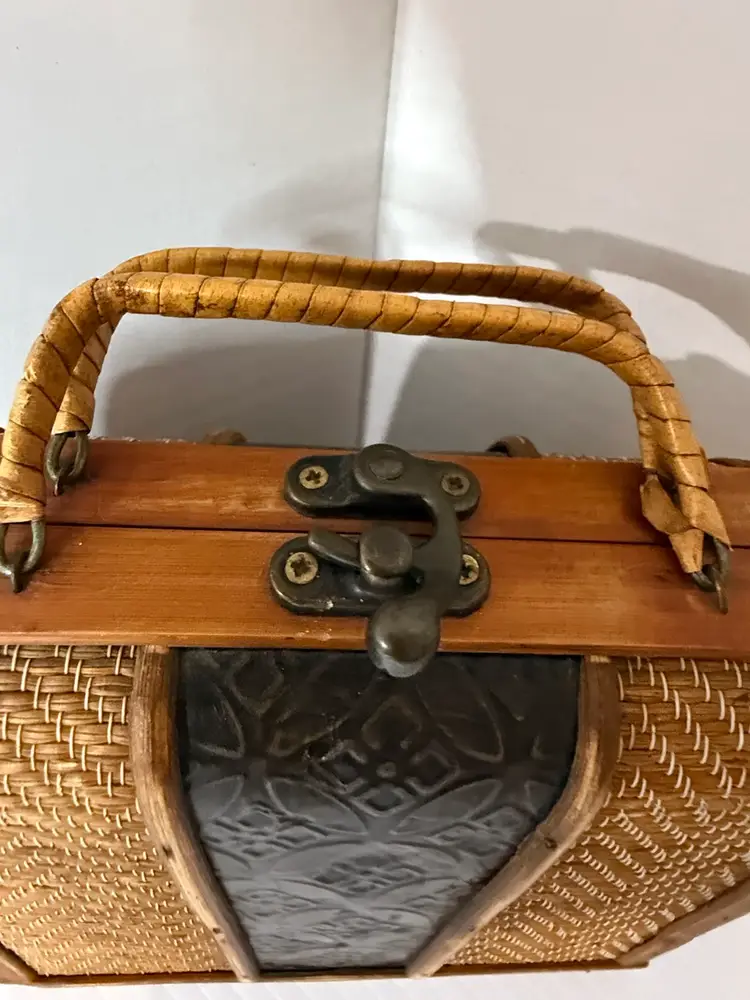 A vintage-style woven rattan and wood storage box / decorative case